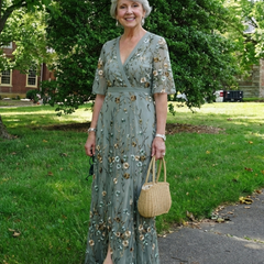 Green V-neck maxi dress with flowing floor-length skirt