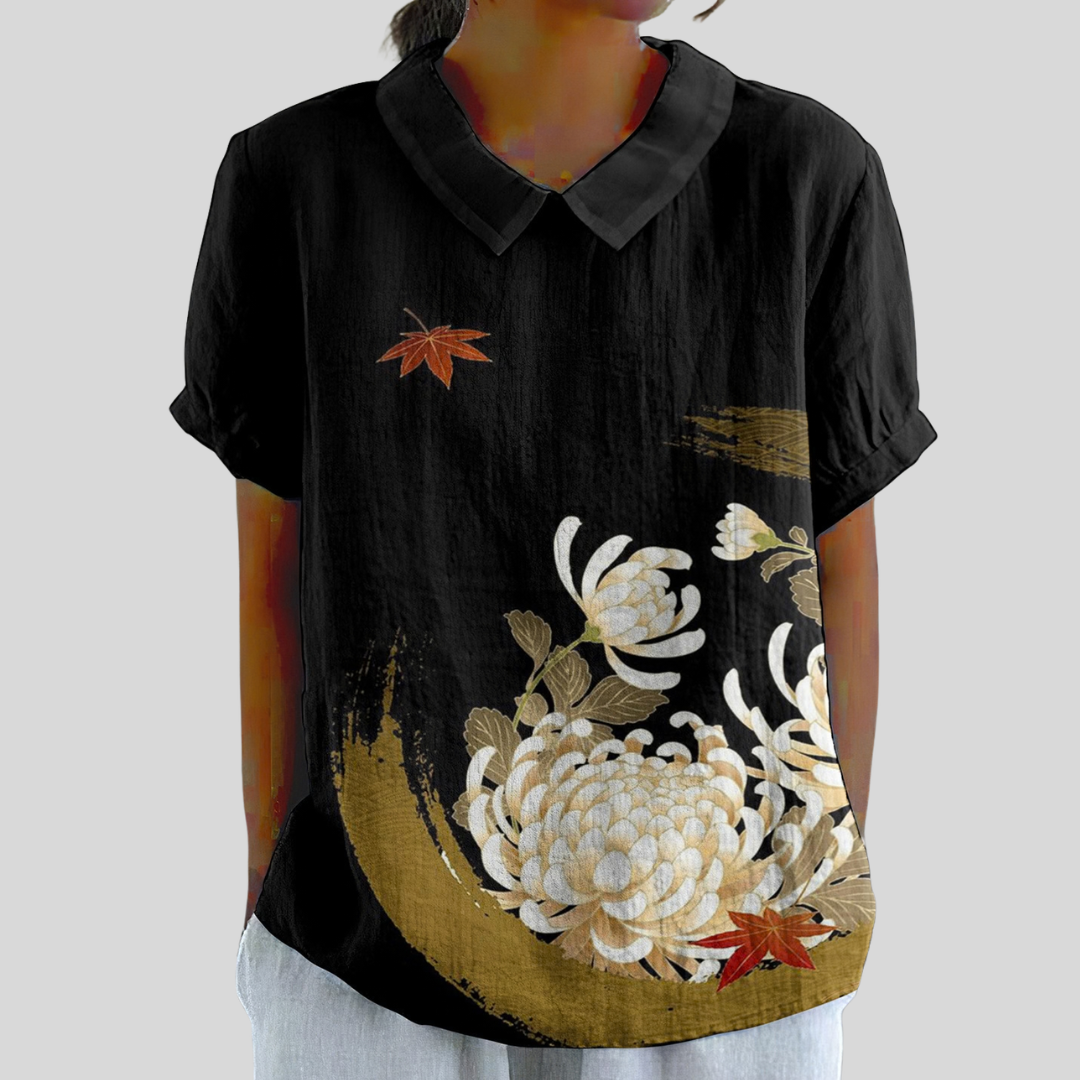 Botanical print collared short-sleeve blouse with a relaxed, feminine silhouette