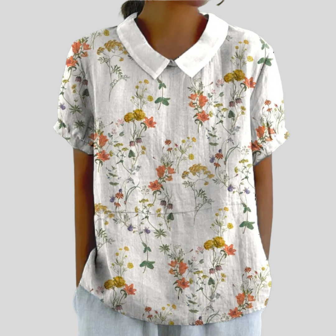 Floral collared short-sleeve blouse with a relaxed, feminine fit