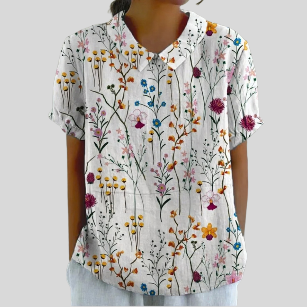 Women's floral collared short-sleeve blouse with a relaxed fit