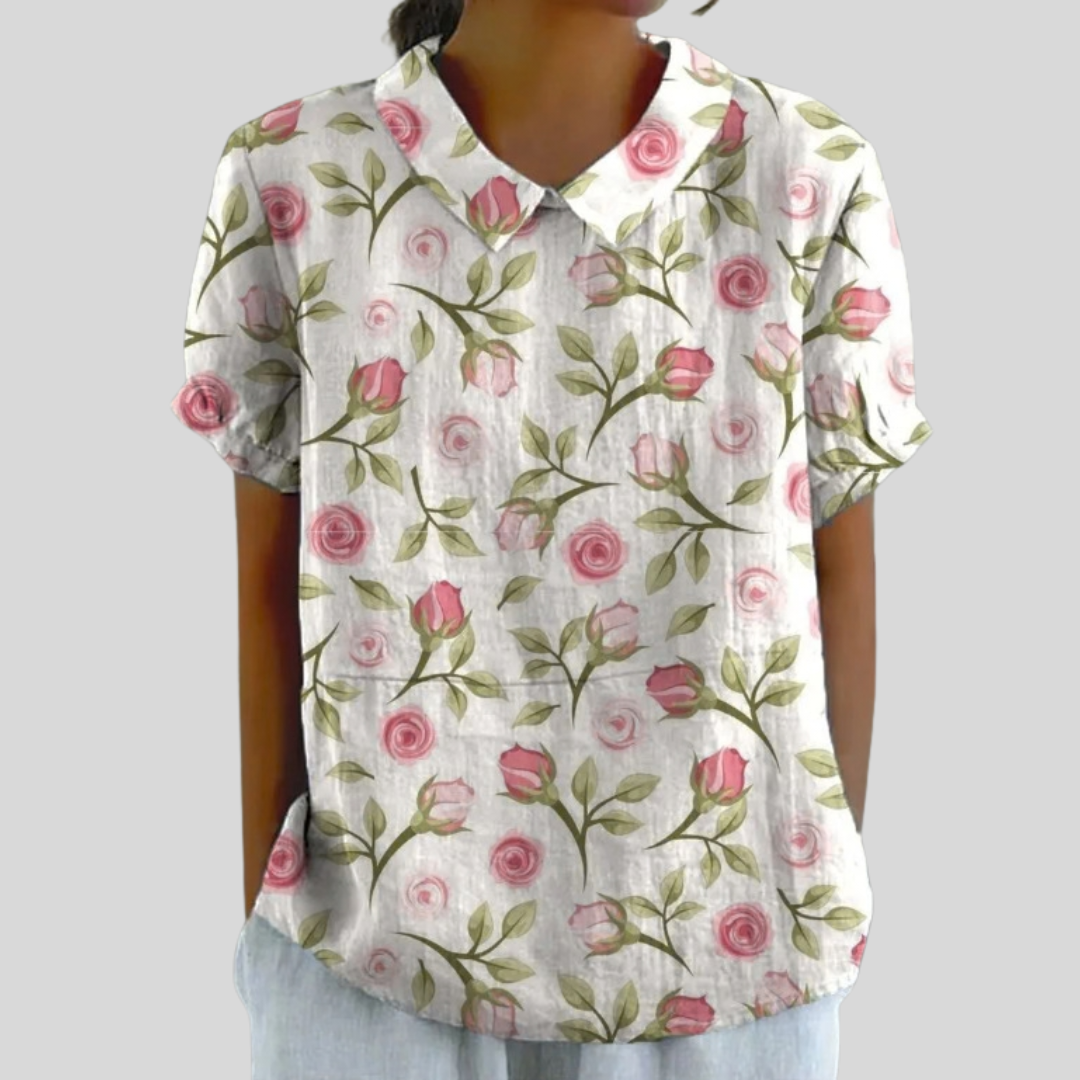 Women's rose print collared blouse with short sleeves and a relaxed fit