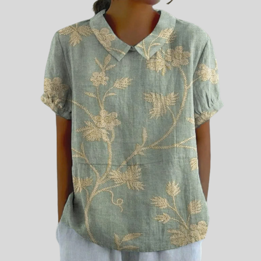 Embroidered floral collared blouse with a graceful collar and relaxed drape