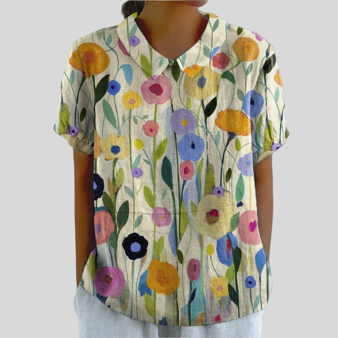 Garden-print collared short-sleeve blouse with a relaxed fit and floral design