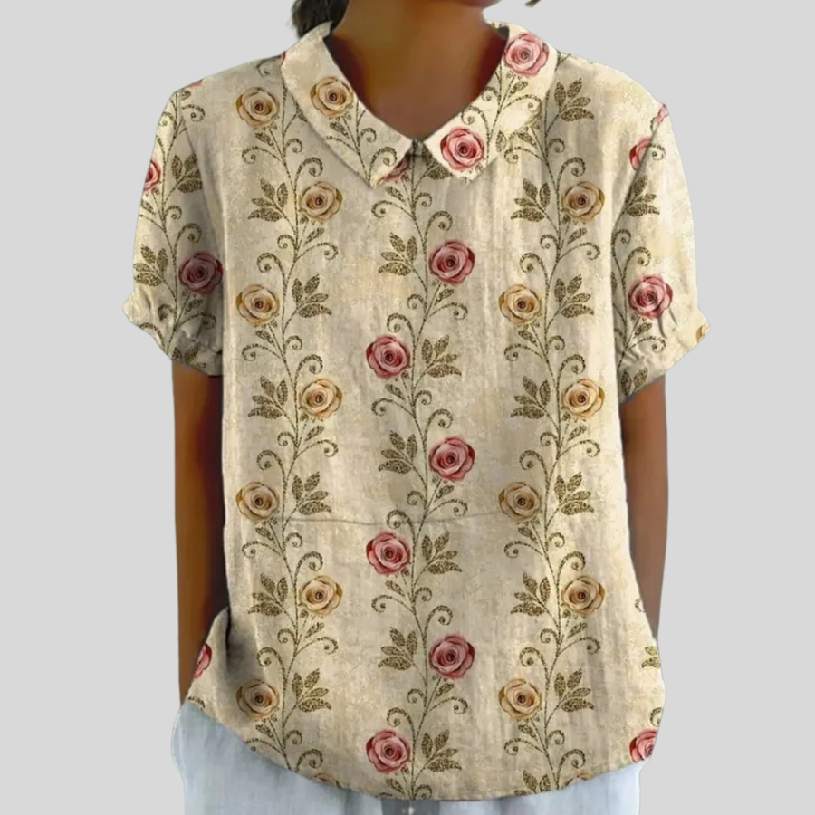 Floral collared short-sleeve blouse with a delicate rose print and relaxed fit