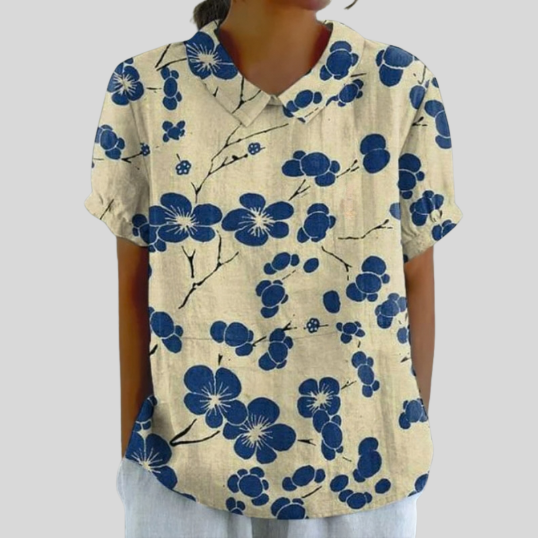 Women's floral print collared short-sleeve blouse with a relaxed fit
