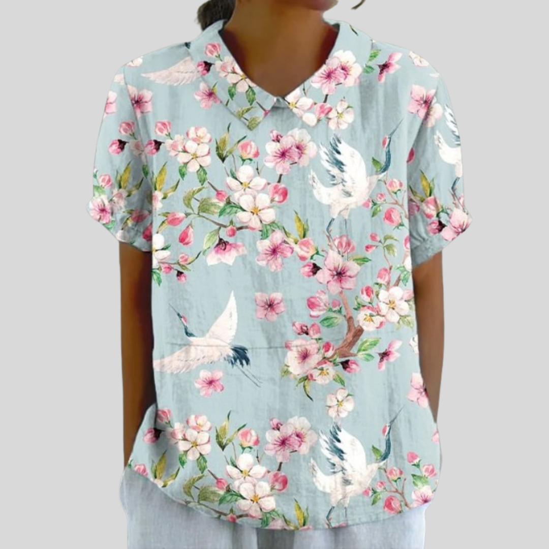 Floral collared short-sleeve blouse with a relaxed, flattering fit