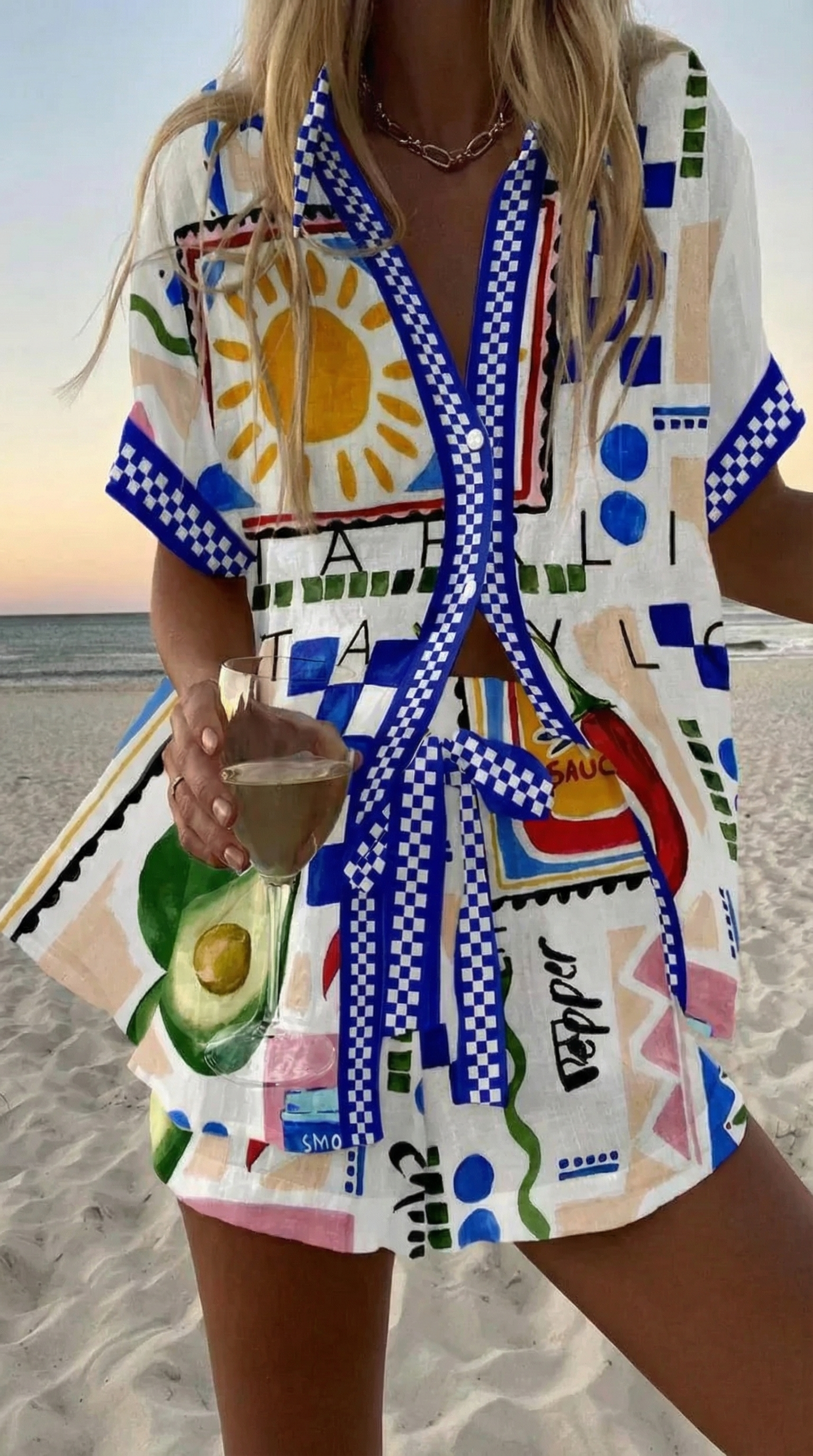 Women's summer co-ord set with maximalist collage print and blue checkered trim on white