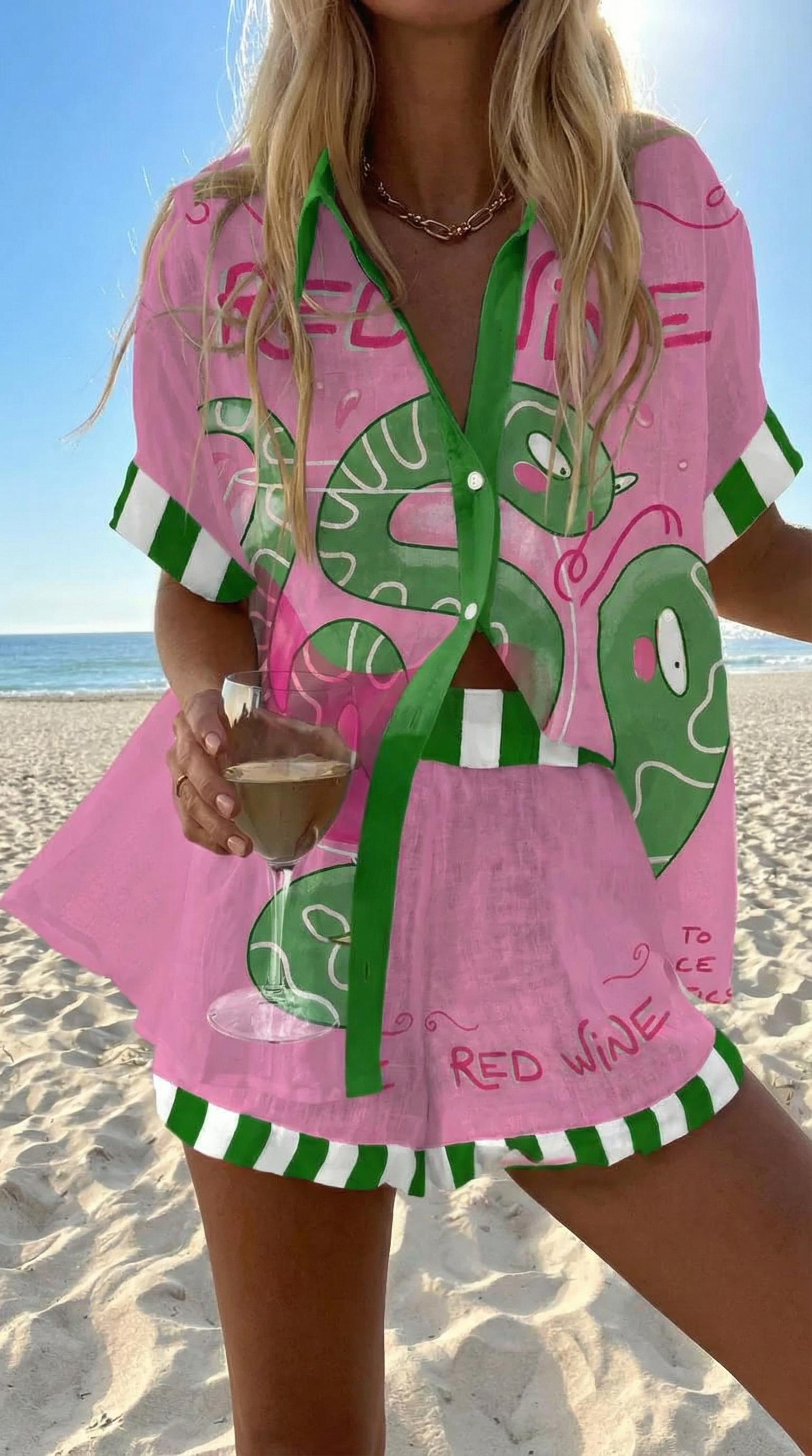 Bubblegum pink summer co-ord set with hand-painted print and green and white stripe details