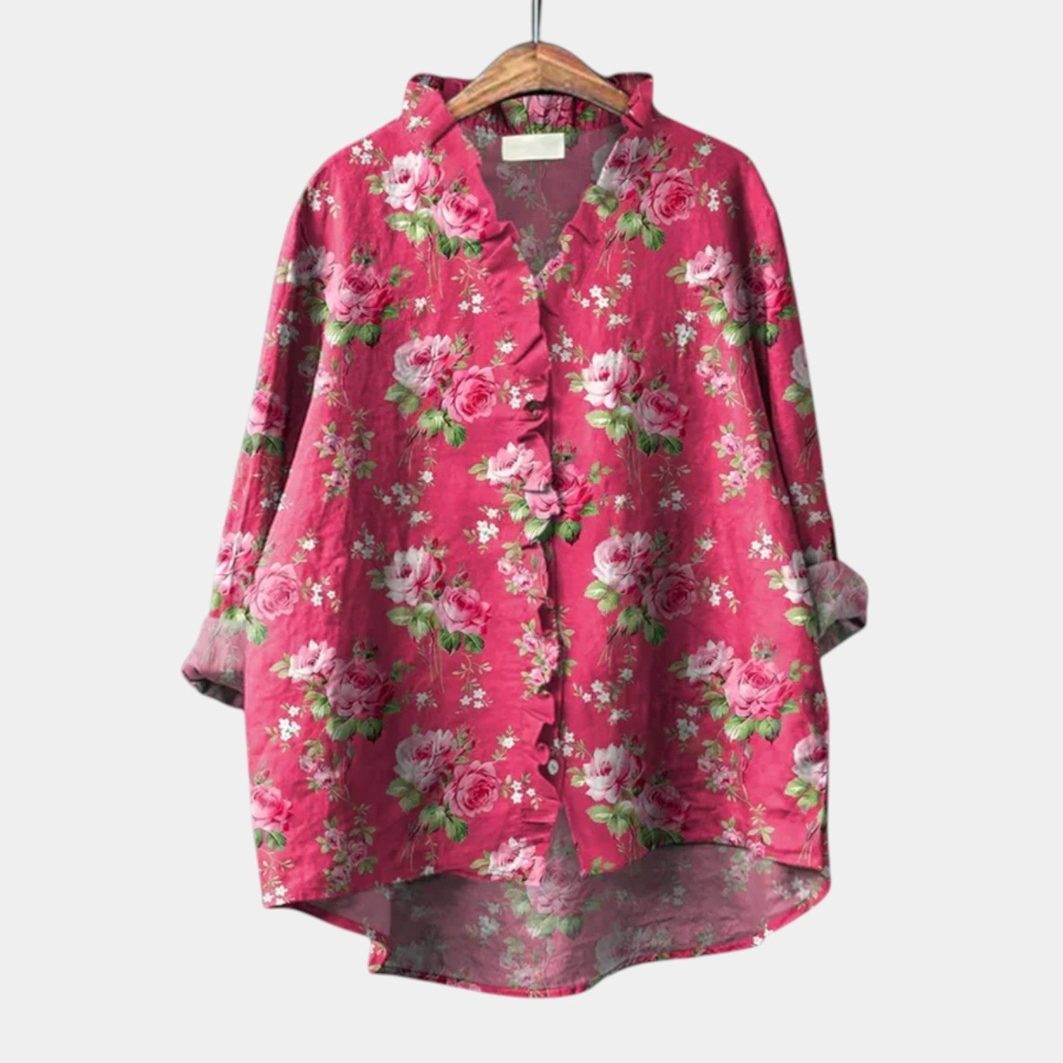 Printed long-sleeve summer blouse styled loose and relaxed on a woman