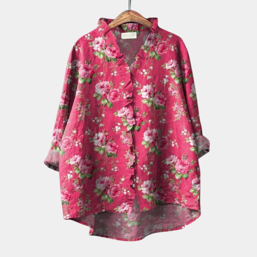 Printed long-sleeve summer blouse styled loose and relaxed on a woman