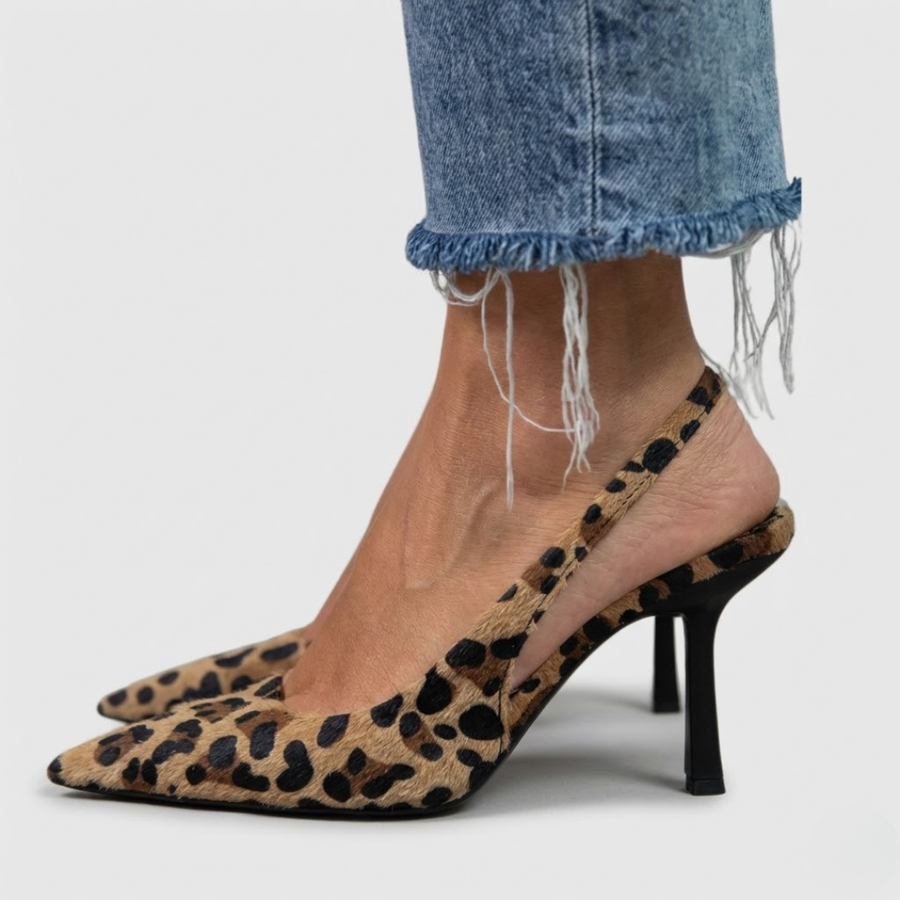 Women's leopard print loafers with a structured design and refined finishing details