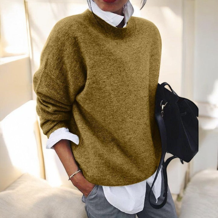 Women's solid single-tone round neck pullover sweater with long sleeves and straight hem