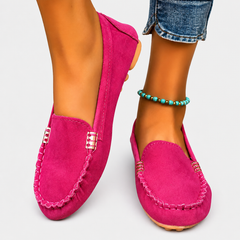 Kaia elegant ballet flats with refined detailing, shown in several colours