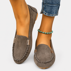 Kaia elegant ballet flats with refined detailing, shown in several colours