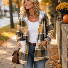 Woman wearing a cosy plaid hooded jacket with a soft, comfortable fit