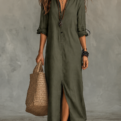 Woman wearing a black button-front bohemian shirt maxi dress with a flowy silhouette