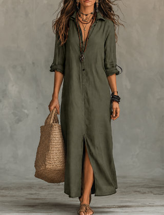 Woman wearing a black button-front bohemian shirt maxi dress with a flowy silhouette