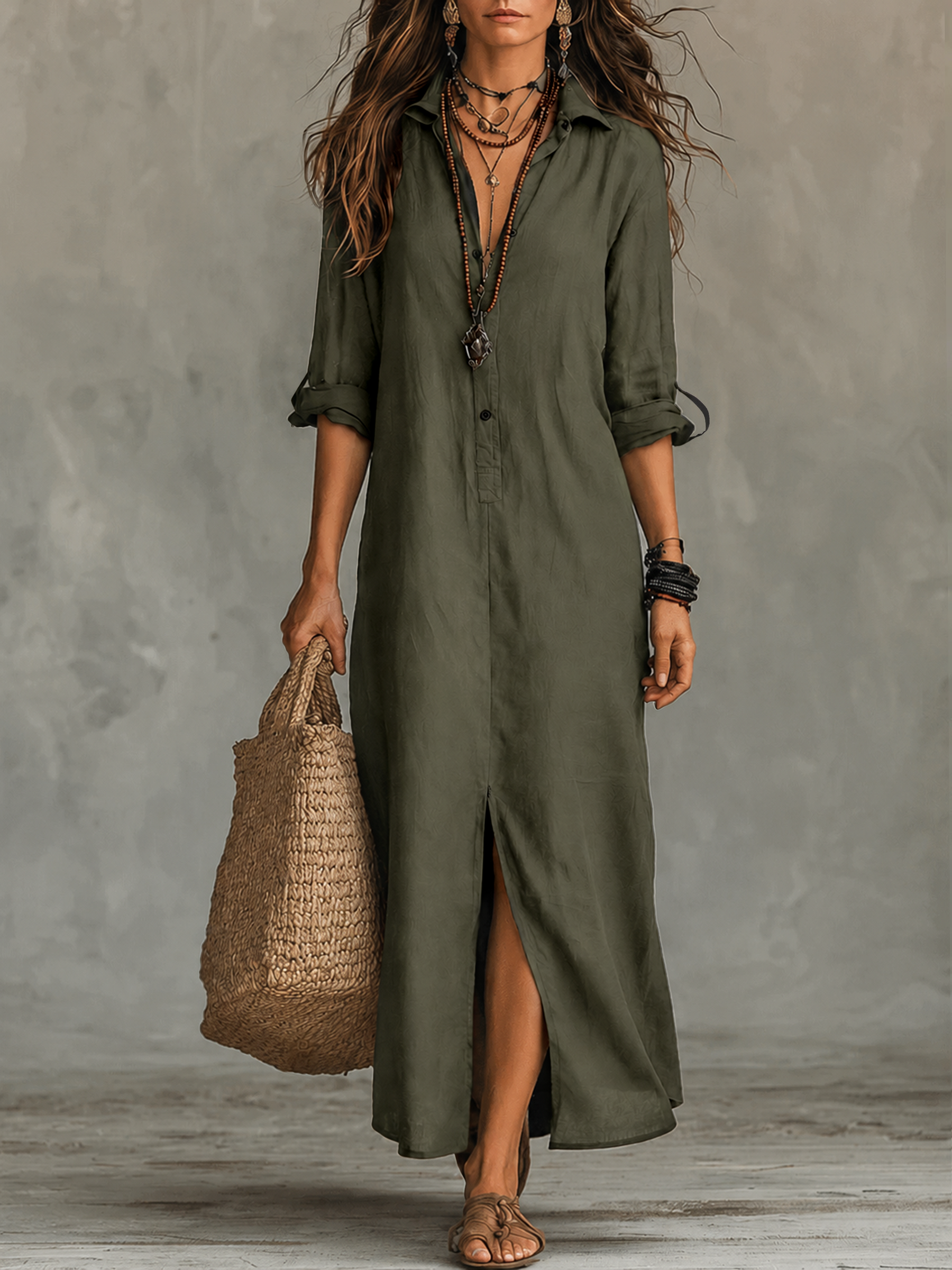 Woman wearing a black button-front bohemian shirt maxi dress with a flowy silhouette