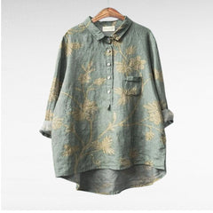 Relaxed button-front blouse in a painterly floral print with collar and chest pocket