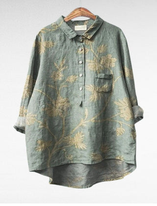 Relaxed button-front blouse in a painterly floral print with collar and chest pocket
