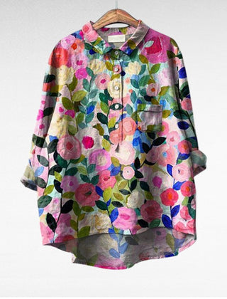Relaxed button-front blouse in a painterly floral print with collar and chest pocket