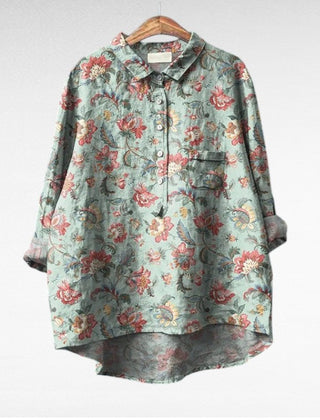Relaxed button-front blouse in a painterly floral print with collar and chest pocket