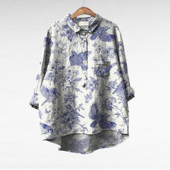 Relaxed button-front blouse in a painterly floral print with collar and chest pocket