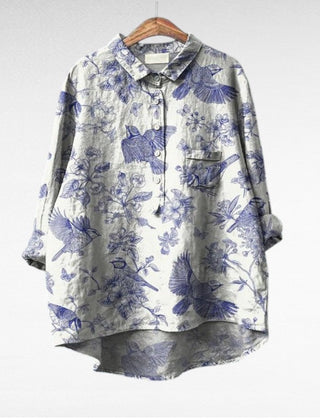 Relaxed button-front blouse in a painterly floral print with collar and chest pocket