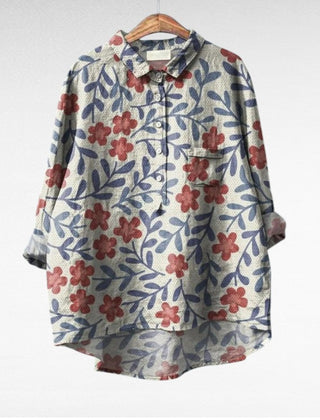 Relaxed button-front blouse in a painterly floral print with collar and chest pocket