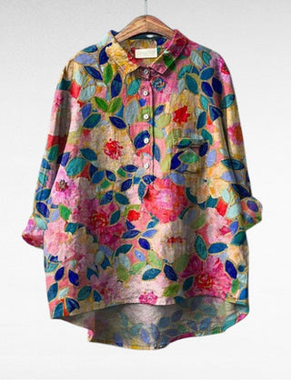 Relaxed button-front blouse in a painterly floral print with collar and chest pocket