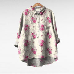 Relaxed button-front blouse in a painterly floral print with collar and chest pocket