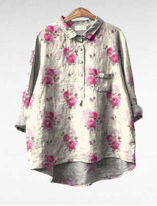 Relaxed button-front blouse in a painterly floral print with collar and chest pocket