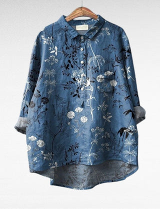 Relaxed button-front blouse in a painterly floral print with collar and chest pocket