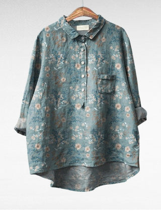 Relaxed button-front blouse in a painterly floral print with collar and chest pocket