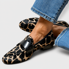 Leopard print slip-on loafers for women with a refined, structured design