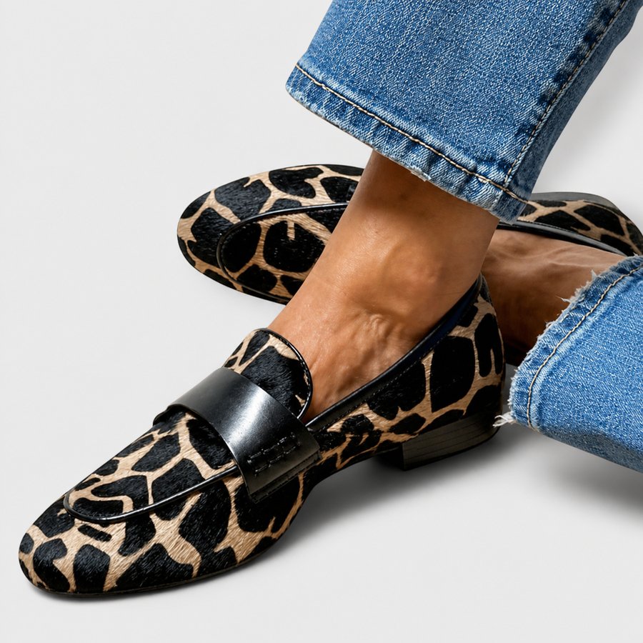 Leopard print slip-on loafers for women with a refined, structured design