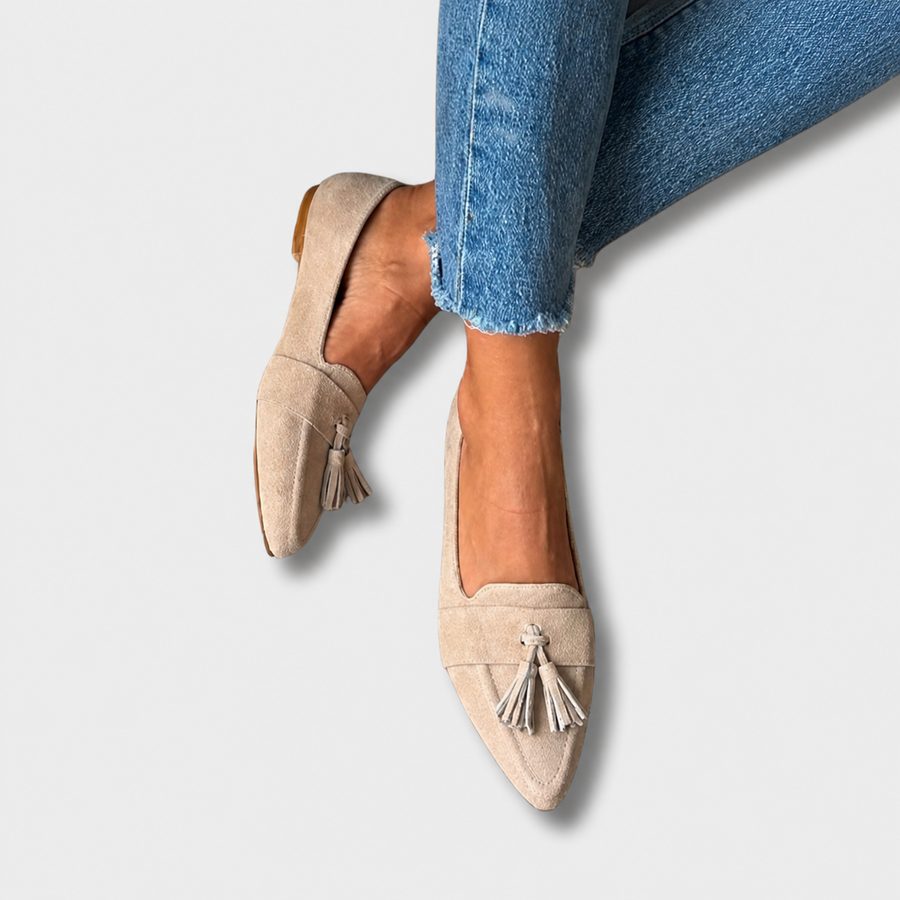 Beige chic loafers with a refined, structured design and subtle finish