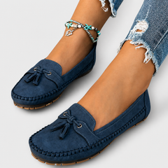 Classic slip-on loafers shown in blue, grey, pink and brown shades