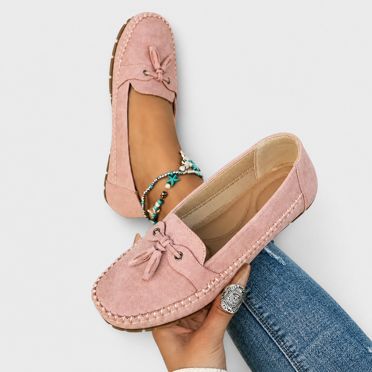Classic slip-on loafers shown in blue, grey, pink and brown shades