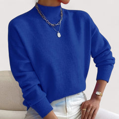Women's relaxed crew neck long sleeve sweater with ribbed cuffs and hemline
