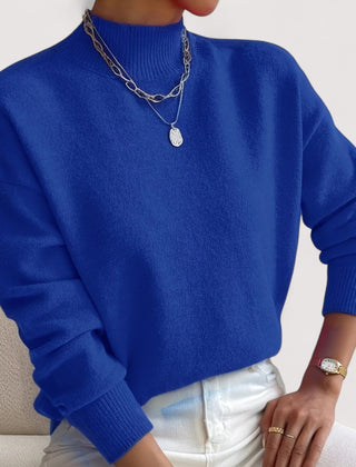 Women's relaxed crew neck long sleeve sweater with ribbed cuffs and hemline