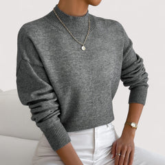 Women's relaxed crew neck long sleeve sweater with ribbed cuffs and hemline