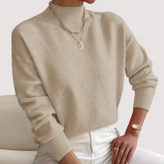 Women's relaxed crew neck long sleeve sweater with ribbed cuffs and hemline