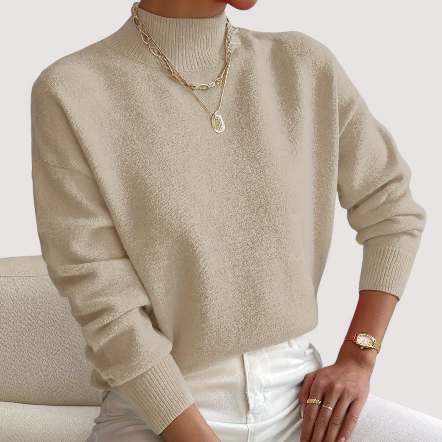 Women's relaxed crew neck long sleeve sweater with ribbed cuffs and hemline