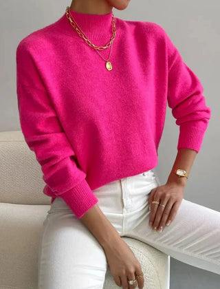 Women's crew neck sweater with ribbed cuffs and hemline in a solid shade