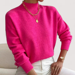 Women's relaxed crew neck long sleeve sweater with ribbed cuffs and hemline