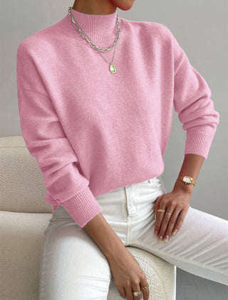 Women's crew neck sweater with ribbed cuffs and hemline in a solid shade