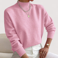 Women's relaxed crew neck long sleeve sweater with ribbed cuffs and hemline