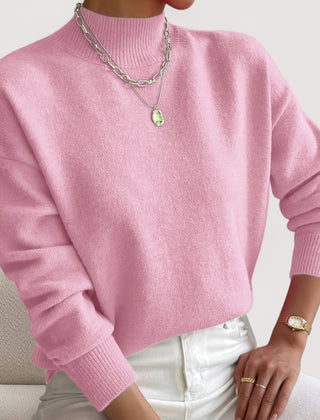 Women's relaxed crew neck long sleeve sweater with ribbed cuffs and hemline