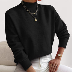 Women's relaxed crew neck long sleeve sweater with ribbed cuffs and hemline